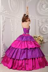 Purple And Fuchsia Layers Quinceanera Dress With Applique