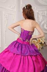 Purple And Fuchsia Layers Quinceanera Dress With Applique