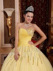 Light Yellow Sweetheart Crystals Decorate Quinceanera Dress