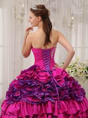Strapless Fuchsia Quinceanera Dress With Rolling Flowers On Skirt