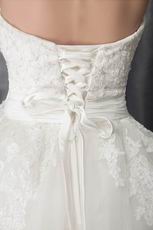 Elegant Strapless Appliqued Ivory Tulle Fabric Bridal Dress
