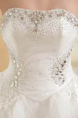 Noble Strapless Lace Up Cream Wedding Gown With Crystal