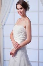 Glamorous Strapless Appliqued Ivory Chapel Lace Wedding Dress