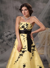 Yellow Strapless Prom Dress With Black Leaves Embroidery Inexpensive