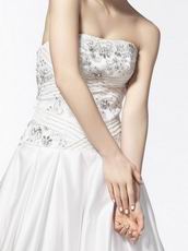 Elegant Strapless Appliqued A-line Chapel Wedding Dress With Beading