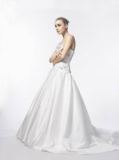 Elegant Strapless Appliqued A-line Chapel Wedding Dress With Beading