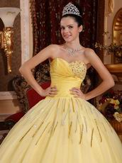 Light Yellow Sweetheart Crystals Decorate Quinceanera Dress