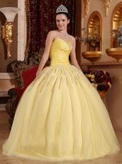 Light Yellow Sweetheart Crystals Decorate Quinceanera Dress