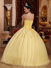 Light Yellow Sweetheart Crystals Decorate Quinceanera Dress