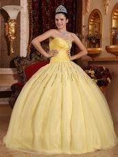 Light Yellow Sweetheart Crystals Decorate Quinceanera Dress